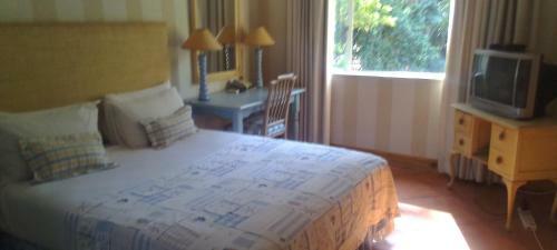 Hostal The Ambassador Suites