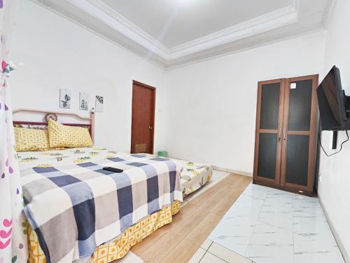 Hostal Homey Guesthouse Kertajaya (syariah)