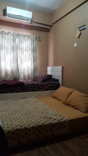 Apartemen The Suites Kayla