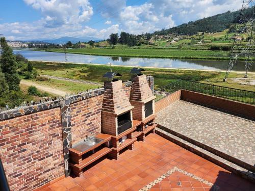 Caba�a En Paipa Con Vista Al Lago