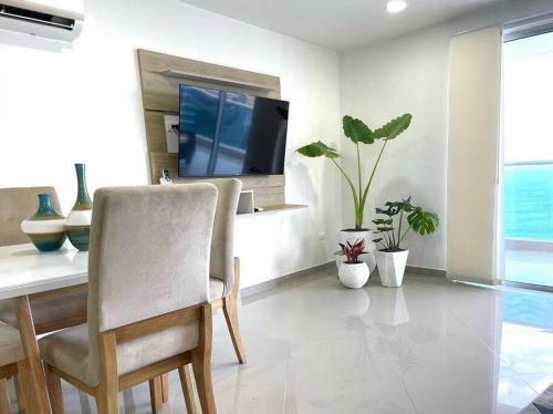 Apartamento Lovely 2-br Oceanfront Condo With Rooftop Pool