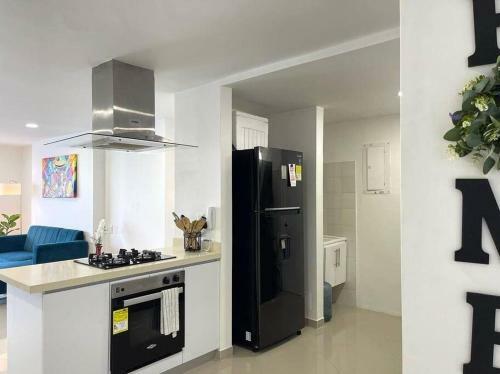 Apartamento Lovely 2-br Oceanfront Condo With Rooftop Pool