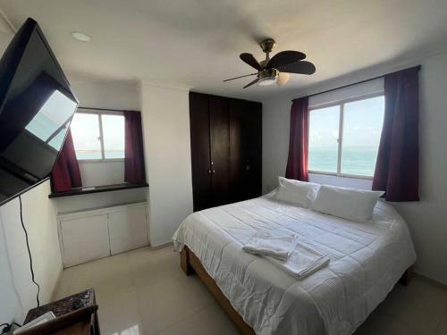 Apartamento Cozy Beachfront Apt Great Views & Pool