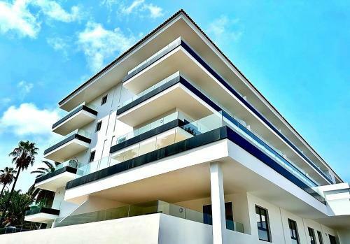 Apartamento Modern Oasis - Pool, Gym & Tennis