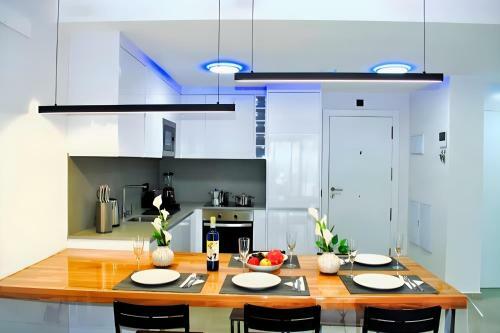 Apartamento Modern Oasis - Pool, Gym & Tennis