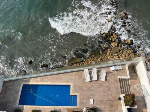 Apartamento Cozy Beachfront Apt Great Views