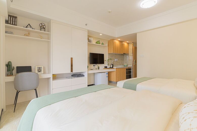 Aparthotel Bainianhui International Apartment
