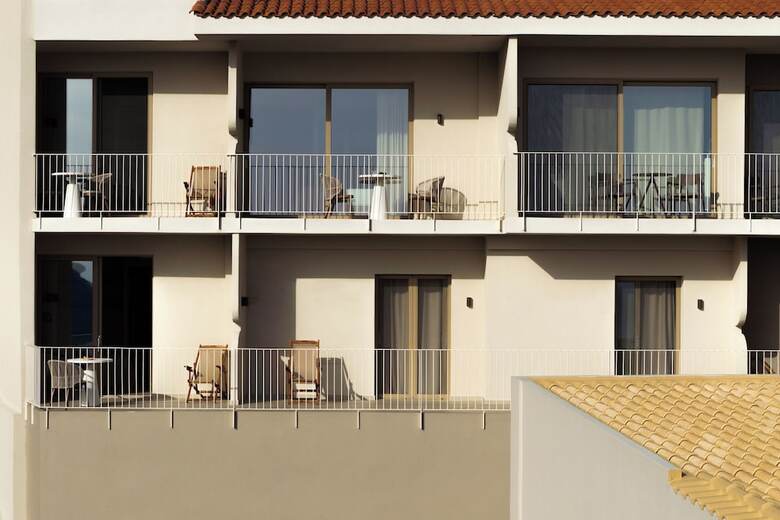 Hotel Stella In The Village Suites