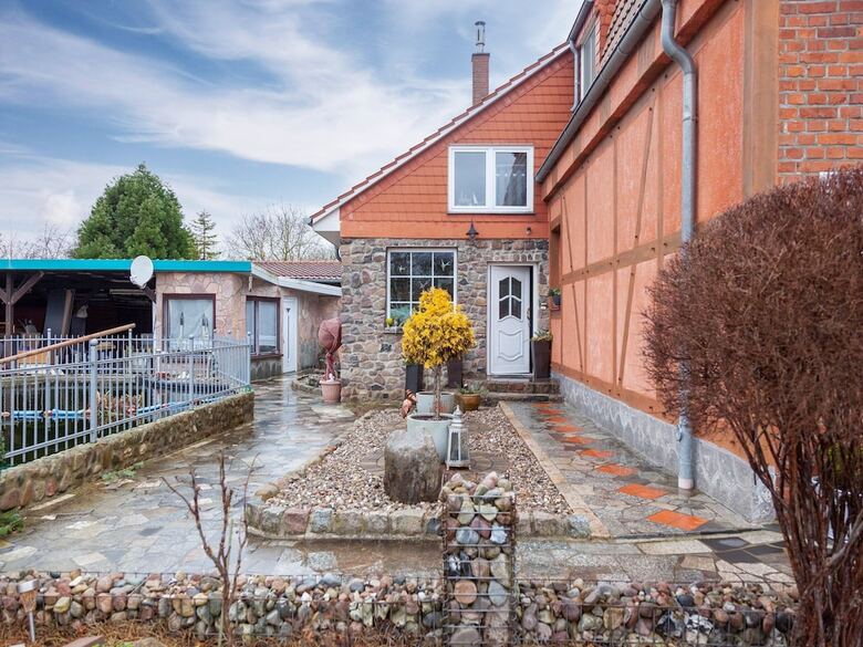 Wohnung In Grundshagen Mit Gartensitzplatz