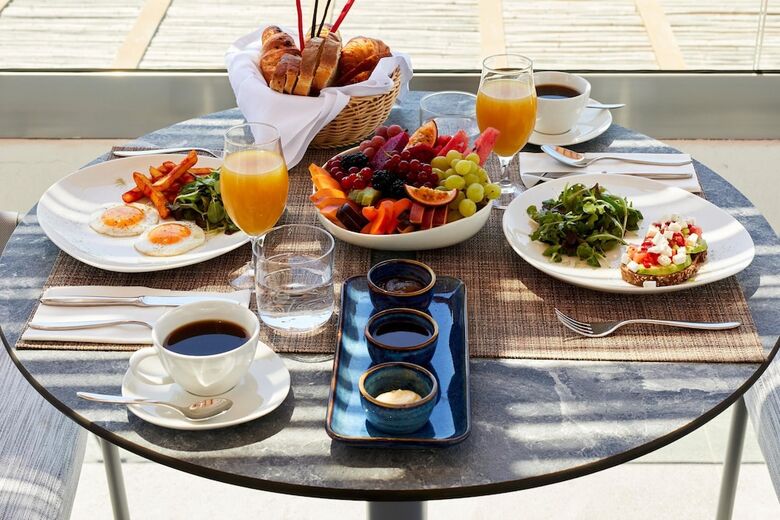 Sea Breeze Santorini Beach Resort, Curio Collection Hilton