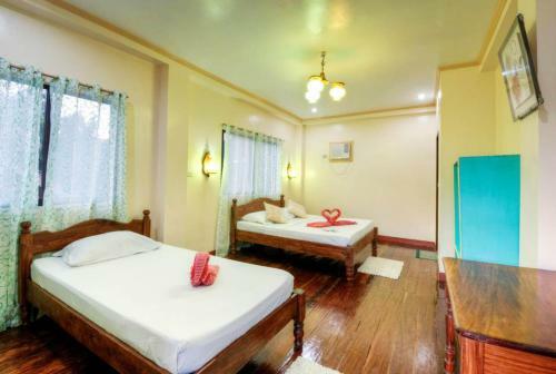 Hotel Lally And Abet Beach Cottages