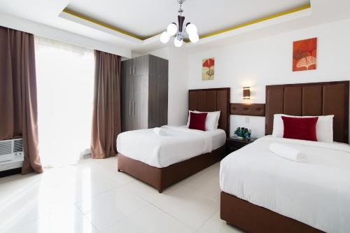 Jmm Apartment Suites