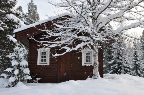 Cottage On Wild River In Lapland/sweden