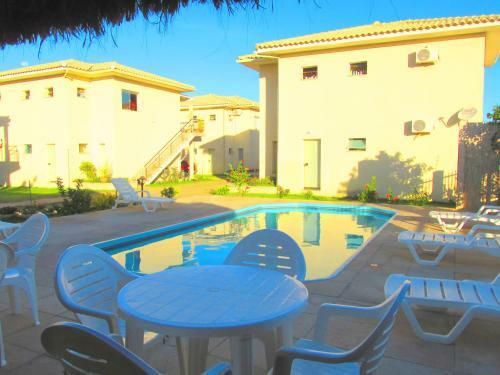 Apartamento Il Pevero Flats