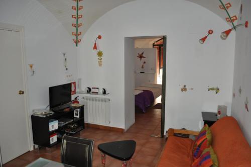 Apartamentos La Casa Pintada