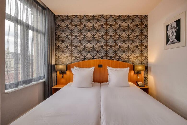 Aris Grand Place Hotel