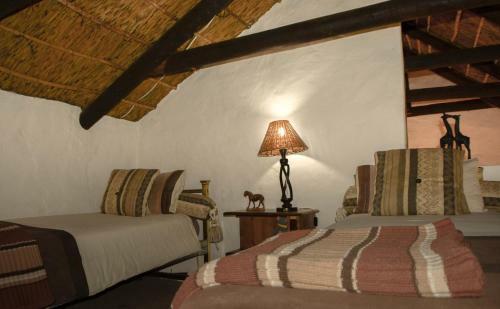 Hostal Old Thatch Lodge