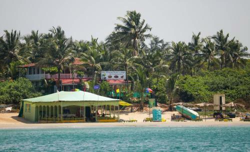 Hostal Pele's Windsong Wood Cottage On The Beach