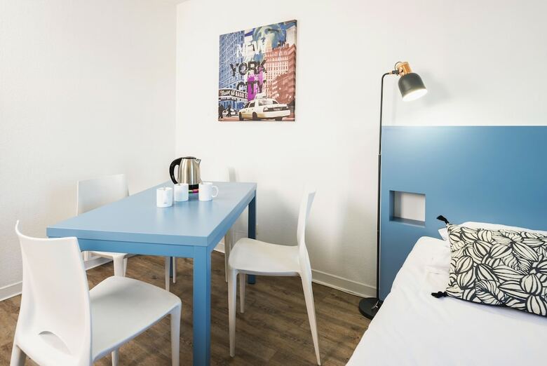Residencia Teneo Suites
