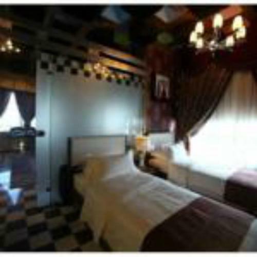 Apartamento Roomi Suites Hotel