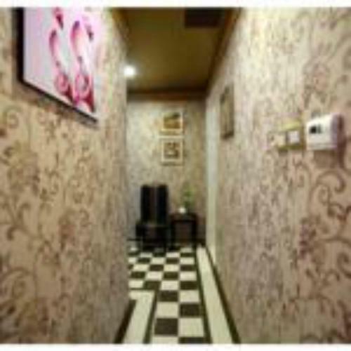 Apartamento Roomi Suites Hotel