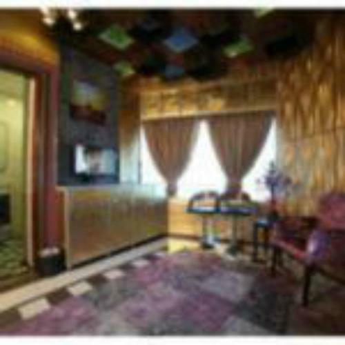 Apartamento Roomi Suites Hotel