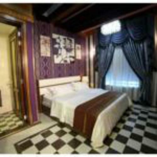 Apartamento Roomi Suites Hotel