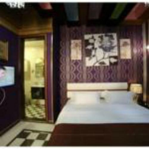 Apartamento Roomi Suites Hotel
