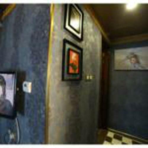 Apartamento Roomi Suites Hotel
