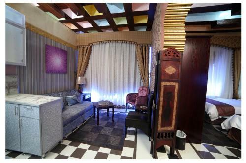 Apartamento Roomi Suites Hotel