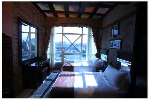 Apartamento Roomi Suites Hotel