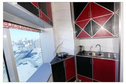 Apartamento Roomi Suites Hotel