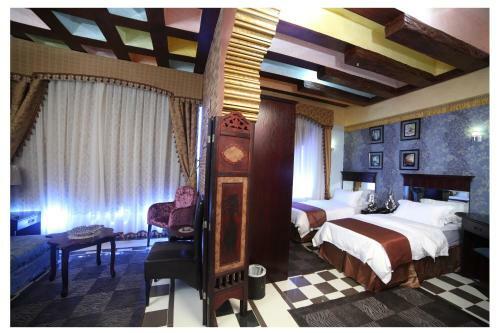 Apartamento Roomi Suites Hotel