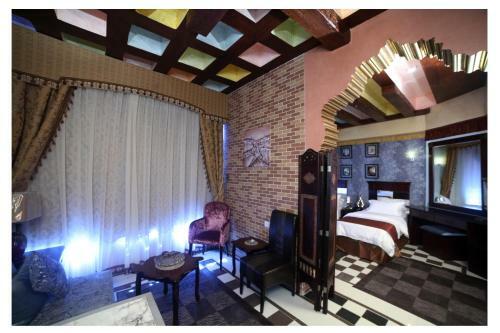 Apartamento Roomi Suites Hotel