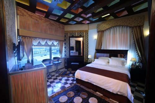 Apartamento Roomi Suites Hotel
