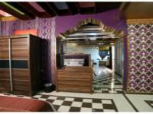 Apartamento Roomi Suites Hotel
