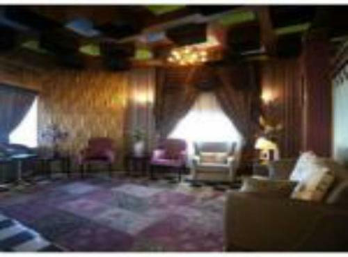 Apartamento Roomi Suites Hotel