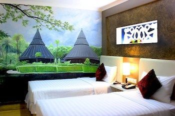 Amos Cozy Hotel & Convention Hall
