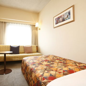 Hotel Com`s