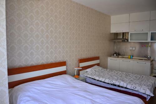 Zhongguancun Daocaoren Apartment