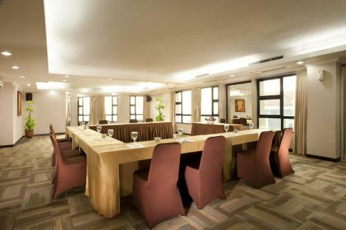 Grand Tropic Suites Hotel