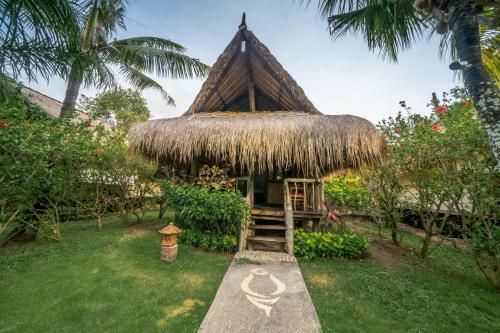 Flower Bud Bungalow Balangan