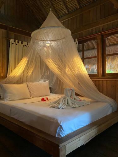 Flower Bud Bungalow Balangan