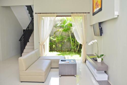 Hotel Denbukit Residence And Suite