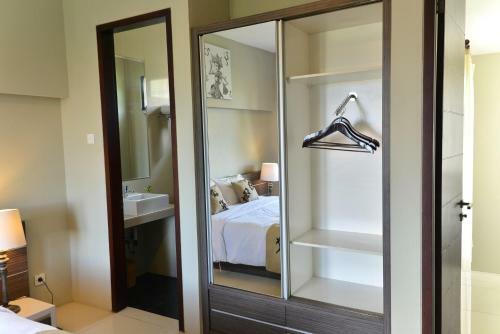 Hotel Denbukit Residence And Suite