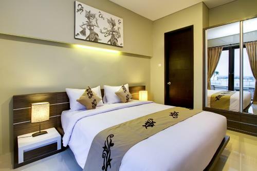 Hotel Denbukit Residence And Suite