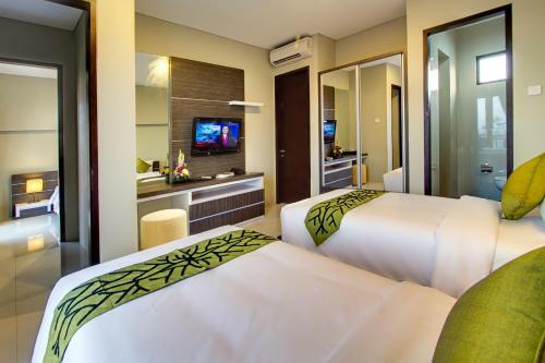 Hotel Denbukit Residence And Suite