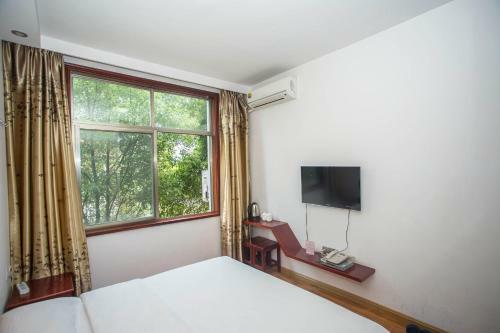 Posada Zhangjiajie Yijiaqin Hotel