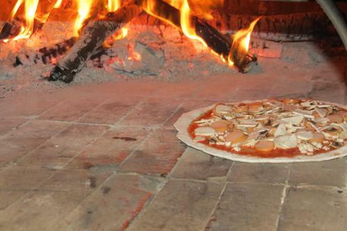 Hostal Pizza Italy Restaurant And Guesthouse