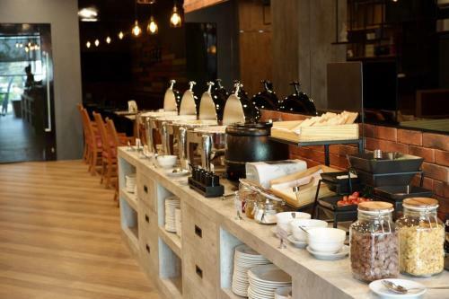 Aparthotel The Sunreno Serviced Apartment